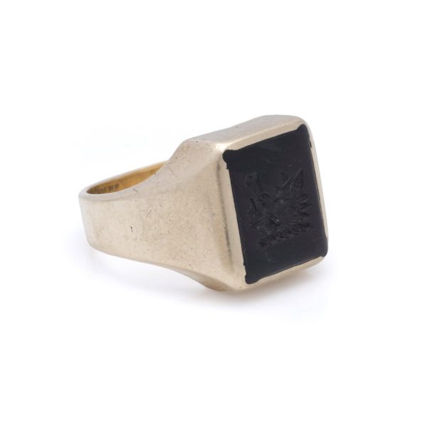 Vintage bloodstone intaglio signet ring in gold.