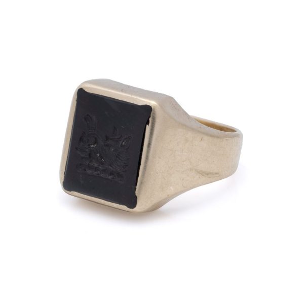 Vintage bloodstone intaglio signet ring in gold.