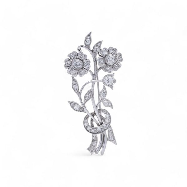 Antique old cut diamond brooch in platinum.