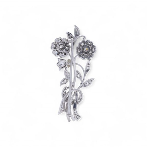 Antique old cut diamond brooch in platinum.