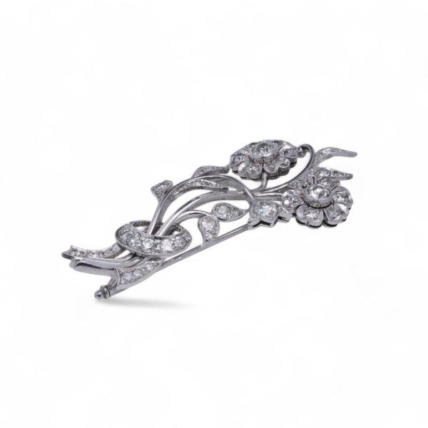 Antique old cut diamond brooch in platinum.