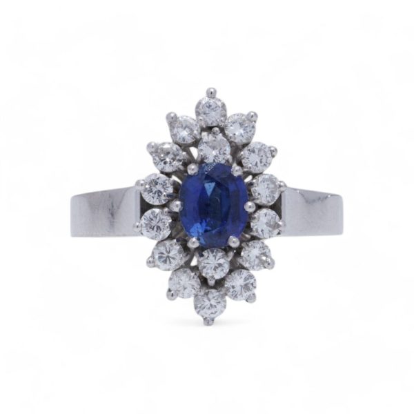 Vintage sapphire and diamond cluster ring in white gold.