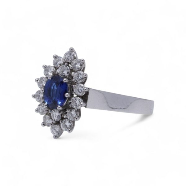 Vintage sapphire and diamond cluster ring in white gold.