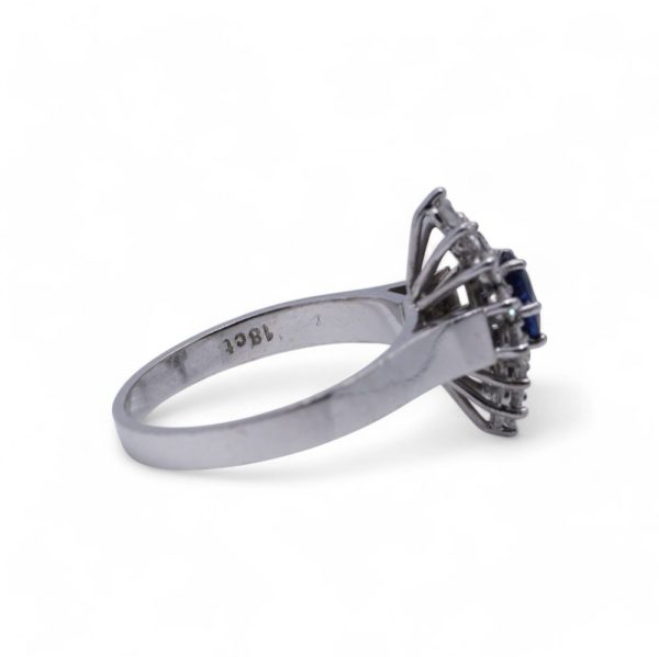 Vintage sapphire and diamond cluster ring in white gold.