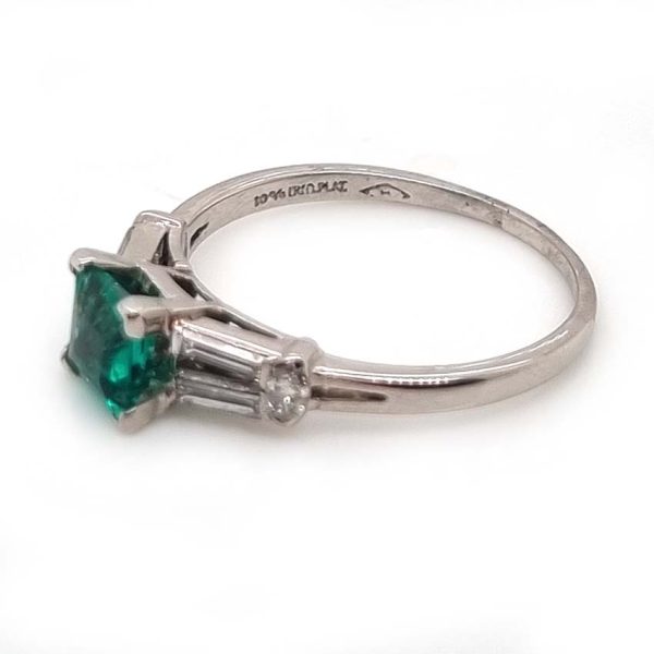 0.63ct Art Deco Colombian Emerald and Baguette Diamond Engagement Ring in Platinum, baguette diamond split shoulders to marquise diamond edges. Circa 1920