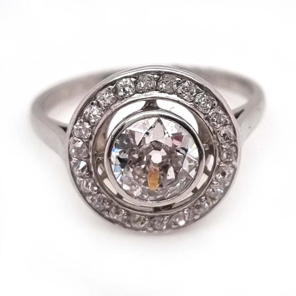 Art Deco 1.25ct Old Cut Diamond Halo Cluster Engagement Ring, 1.25ct old European cut diamond surrounded by fixed halo of old mine-cut diamonds in platinum