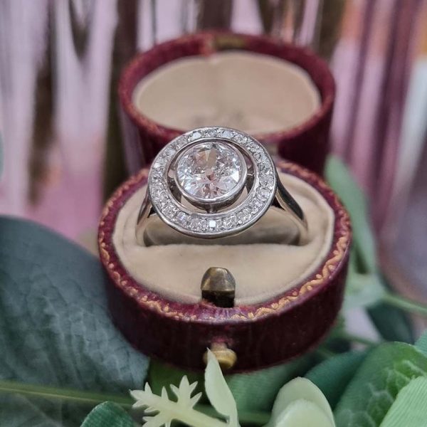 Art Deco 1.25ct Old Cut Diamond Halo Cluster Engagement Ring, 1.25ct old European cut diamond surrounded by fixed halo of old mine-cut diamonds in platinum