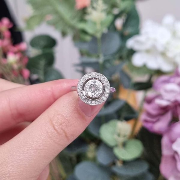 Art Deco 1.25ct Old Cut Diamond Halo Cluster Engagement Ring, 1.25ct old European cut diamond surrounded by fixed halo of old mine-cut diamonds in platinum