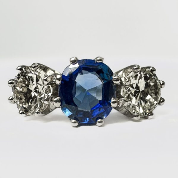 Antique Edwardian Ceylon sapphire and diamond trilogy engagement ring