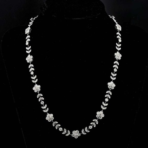 Vintage Italian 6.5ct Diamond Flower Cluster Collar Necklace, G VVS, delicate foliage and daisy flowers combination set with 180 fine quality brilliant-cut diamonds in 18ct white gold. Circa 1990