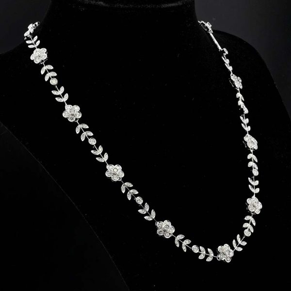 Vintage Italian 6.5ct Diamond Flower Cluster Collar Necklace, G VVS, delicate foliage and daisy flowers combination set with 180 fine quality brilliant-cut diamonds in 18ct white gold. Circa 1990