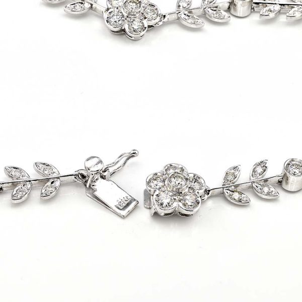 Vintage Italian 6.5ct Diamond Flower Cluster Collar Necklace, G VVS, delicate foliage and daisy flowers combination set with 180 fine quality brilliant-cut diamonds in 18ct white gold. Circa 1990
