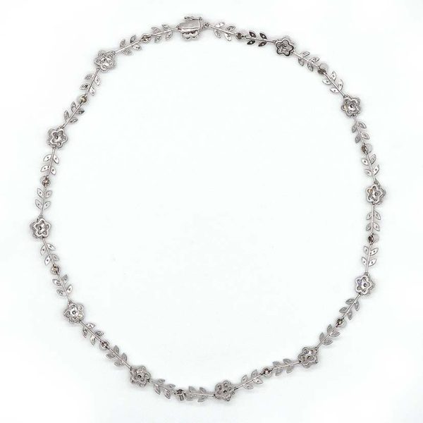 Vintage Italian 6.5ct Diamond Flower Cluster Collar Necklace, G VVS, delicate foliage and daisy flowers combination set with 180 fine quality brilliant-cut diamonds in 18ct white gold. Circa 1990