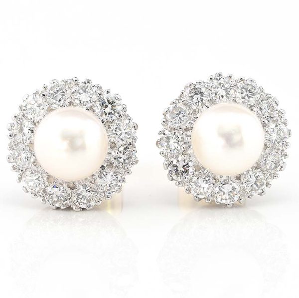 Vintage Pearl and Diamond Cluster Stud Earrings, 8mm white silvery natural saltwater cultured pearls surrounded by 2.40 carats of round brilliant-cut diamonds in 18ct gold