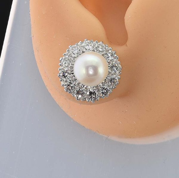 Vintage Pearl and Diamond Cluster Stud Earrings, 8mm white silvery natural saltwater cultured pearls surrounded by 2.40 carats of round brilliant-cut diamonds in 18ct gold