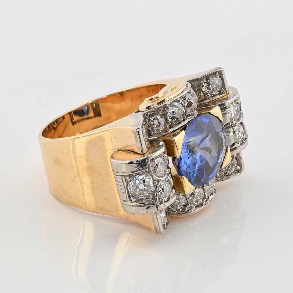 Art Deco 5.60ct Verneuil Sapphire and 3.20ct Diamond Tank Ring, 5.60ct oval royal blue lab made Verneuil sapphire within 3.20ct surround of old mine-cut diamonds in 18ct yellow gold geometric design. Circa 1925
