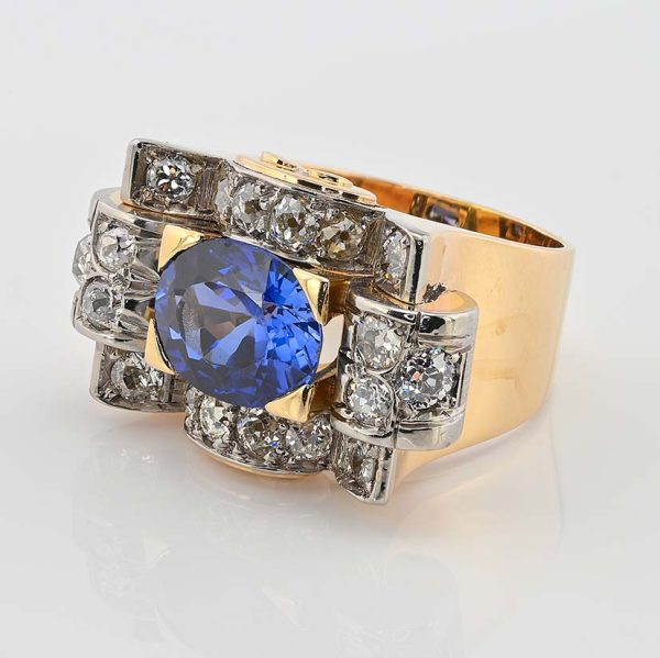 Art Deco 5.60ct Verneuil Sapphire and 3.20ct Diamond Tank Ring, 5.60ct oval royal blue lab made Verneuil sapphire within 3.20ct surround of old mine-cut diamonds in 18ct yellow gold geometric design. Circa 1925