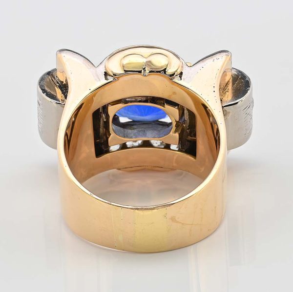 Art Deco 5.60ct Verneuil Sapphire and 3.20ct Diamond Tank Ring, 5.60ct oval royal blue lab made Verneuil sapphire within 3.20ct surround of old mine-cut diamonds in 18ct yellow gold geometric design. Circa 1925