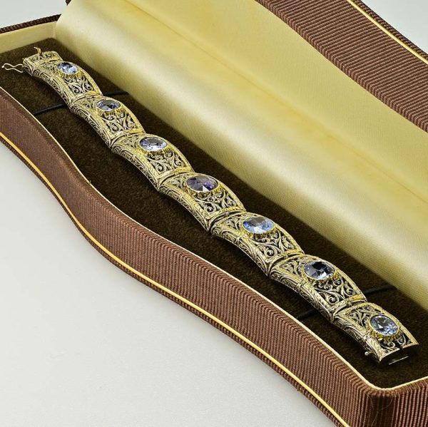Vintage 19.45ct Natural No Heat Ceylon Sapphire Panel Link Bracelet, Ornate silver topped gold panels with seven natural unheated Ceylon sapphires, central sapphire is lovely fleur de lys Lavender purple colour. Circa 1935