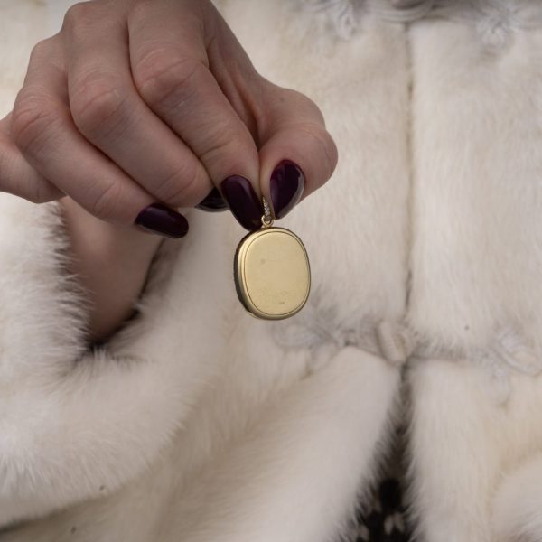 Gold pendant with diamonds.