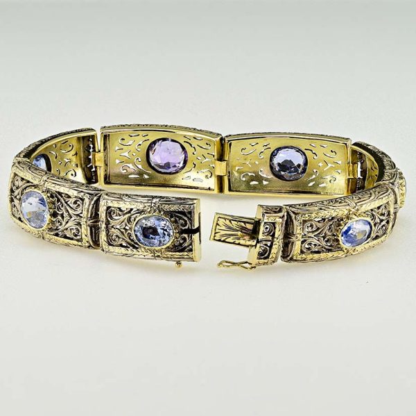 Vintage 19.45ct Natural No Heat Ceylon Sapphire Panel Link Bracelet, Ornate silver topped gold panels with seven natural unheated Ceylon sapphires, central sapphire is lovely fleur de lys Lavender purple colour. Circa 1935