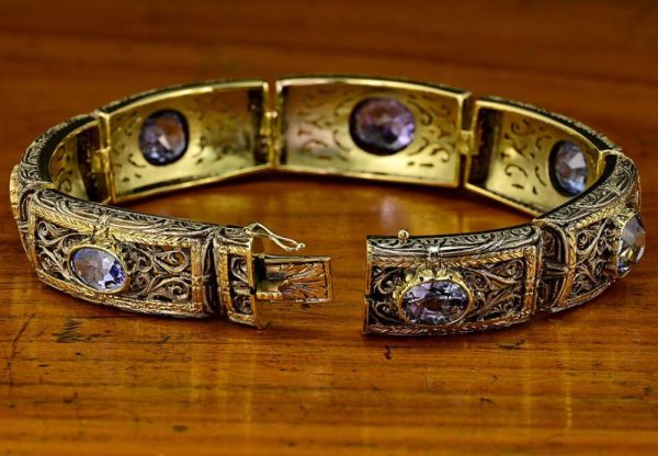 Vintage 19.45ct Natural No Heat Ceylon Sapphire Panel Link Bracelet, Ornate silver topped gold panels with seven natural unheated Ceylon sapphires, central sapphire is lovely fleur de lys Lavender purple colour. Circa 1935