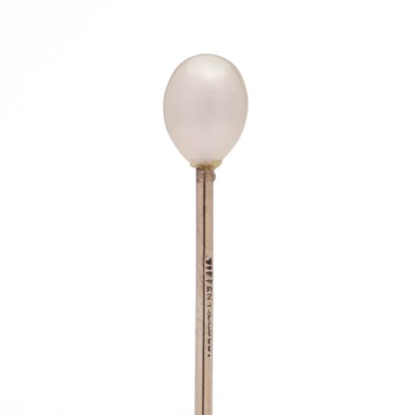 Vintage pearl stick pin in gold.