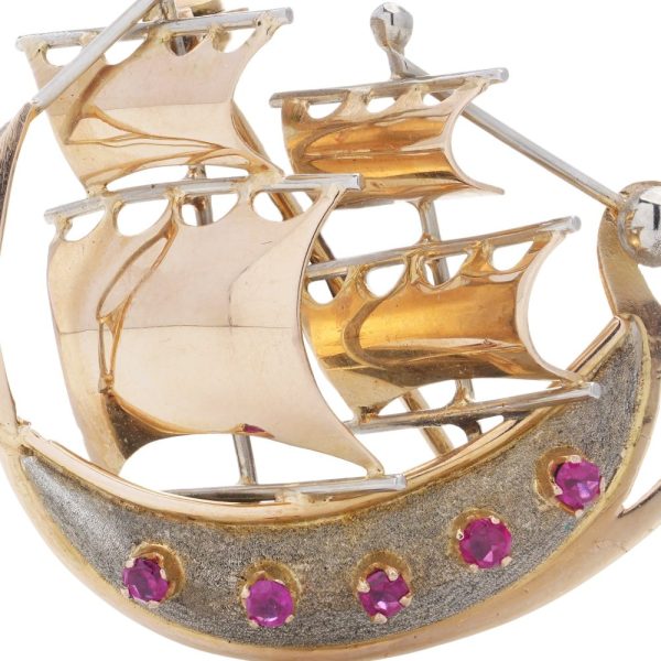 Gold sailing ship brooch with rubies.