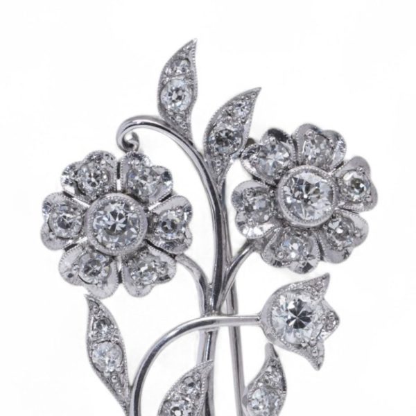 Antique old cut diamond brooch in platinum.
