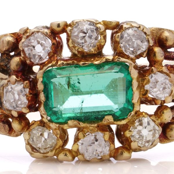 Victorian emerald and diamond cluster ring in gold.
