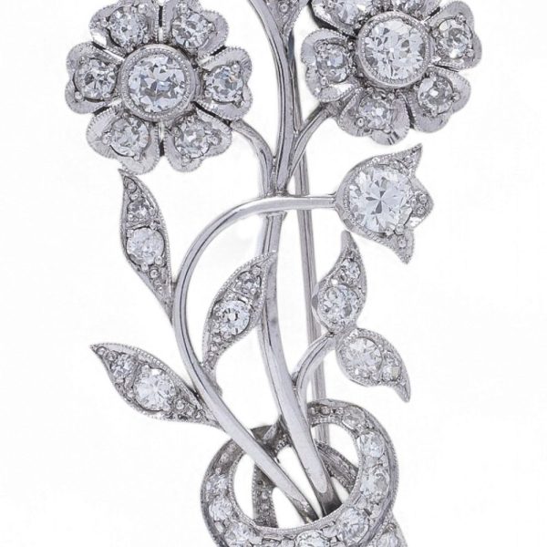 Antique old cut diamond brooch in platinum.