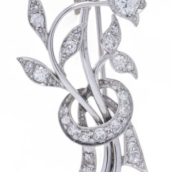 Antique old cut diamond brooch in platinum.