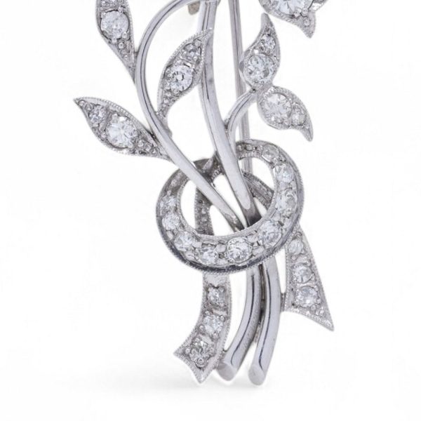 Antique old cut diamond brooch in platinum.