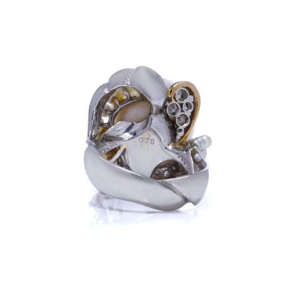 Pearl and diamond cocktail ring in platinum and white gold.