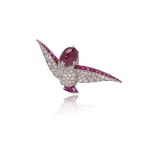 Vintage diamond and ruby hummingbird brooch in platinum.