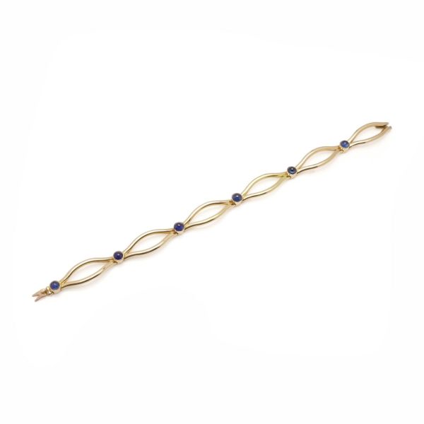 Faberge sapphire link bracelet in gold.