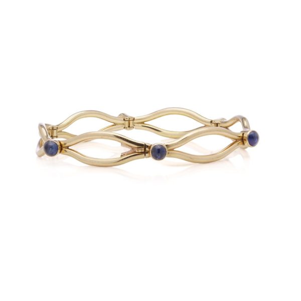 Faberge sapphire link bracelet in gold.