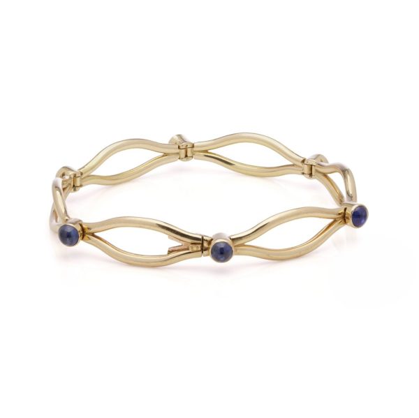 Faberge sapphire link bracelet in gold.
