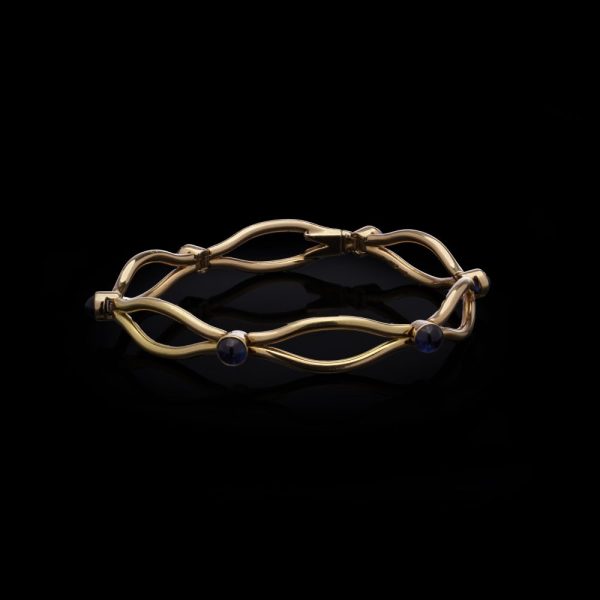Faberge sapphire link bracelet in gold.