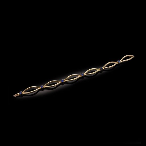 Faberge sapphire link bracelet in gold.