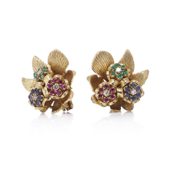 Vintage Kutchinsky gold flower earrings with gemstones.