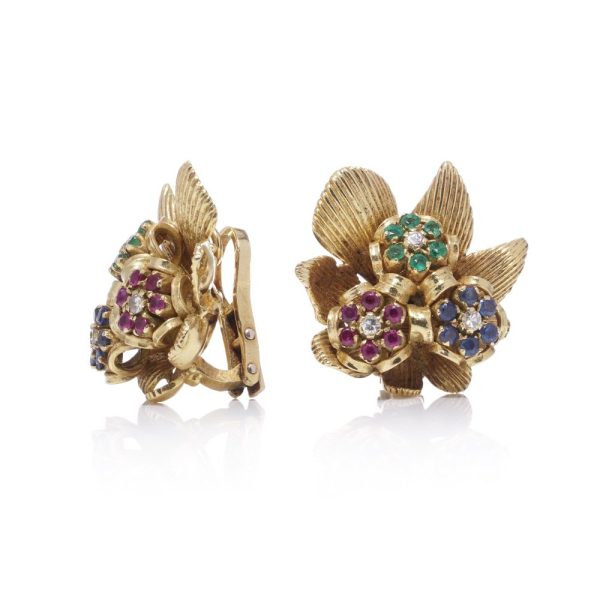 Vintage Kutchinsky gold flower earrings with gemstones.