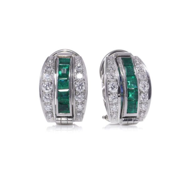 Reversible earrings with sapphires, emeralds and diamonds in platinum.