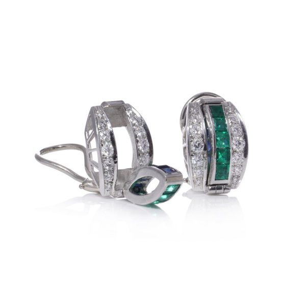 Reversible earrings with sapphires, emeralds and diamonds in platinum.