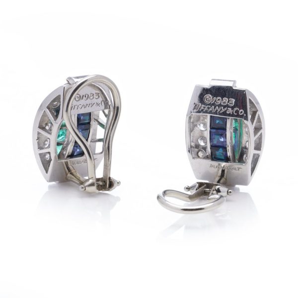 Reversible earrings with sapphires, emeralds and diamonds in platinum.