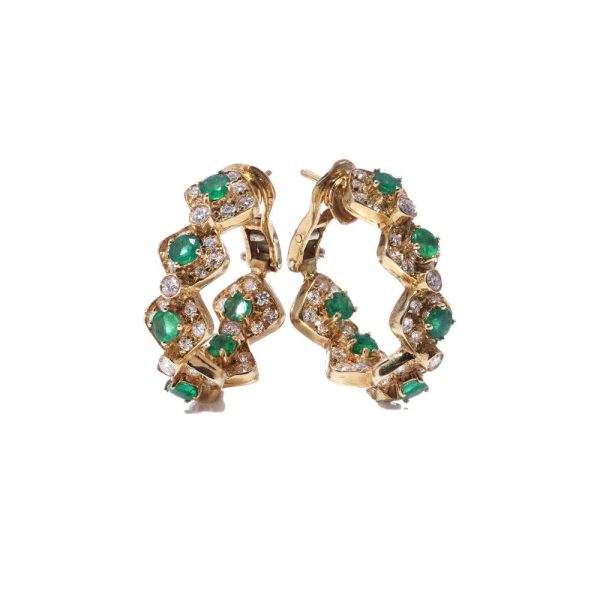 Emerald and diamond earrings in yellow gold.