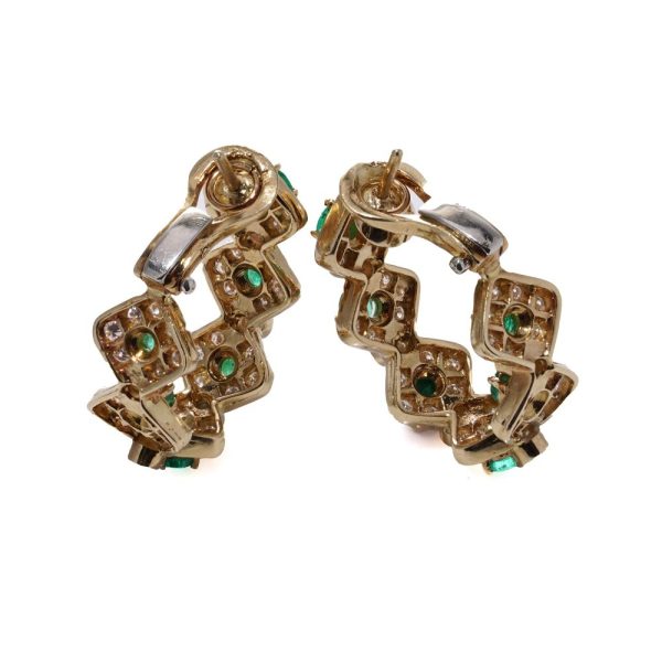 Emerald and diamond earrings in yellow gold.
