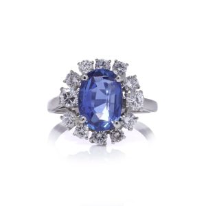 Sapphire and diamond cluster ring in white gold.