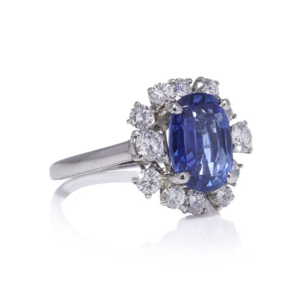 Sapphire and diamond cluster ring in white gold.