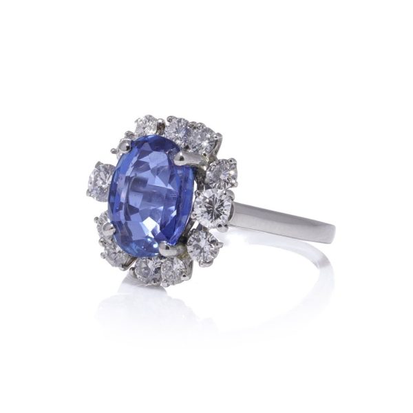 Sapphire and diamond cluster ring in white gold.